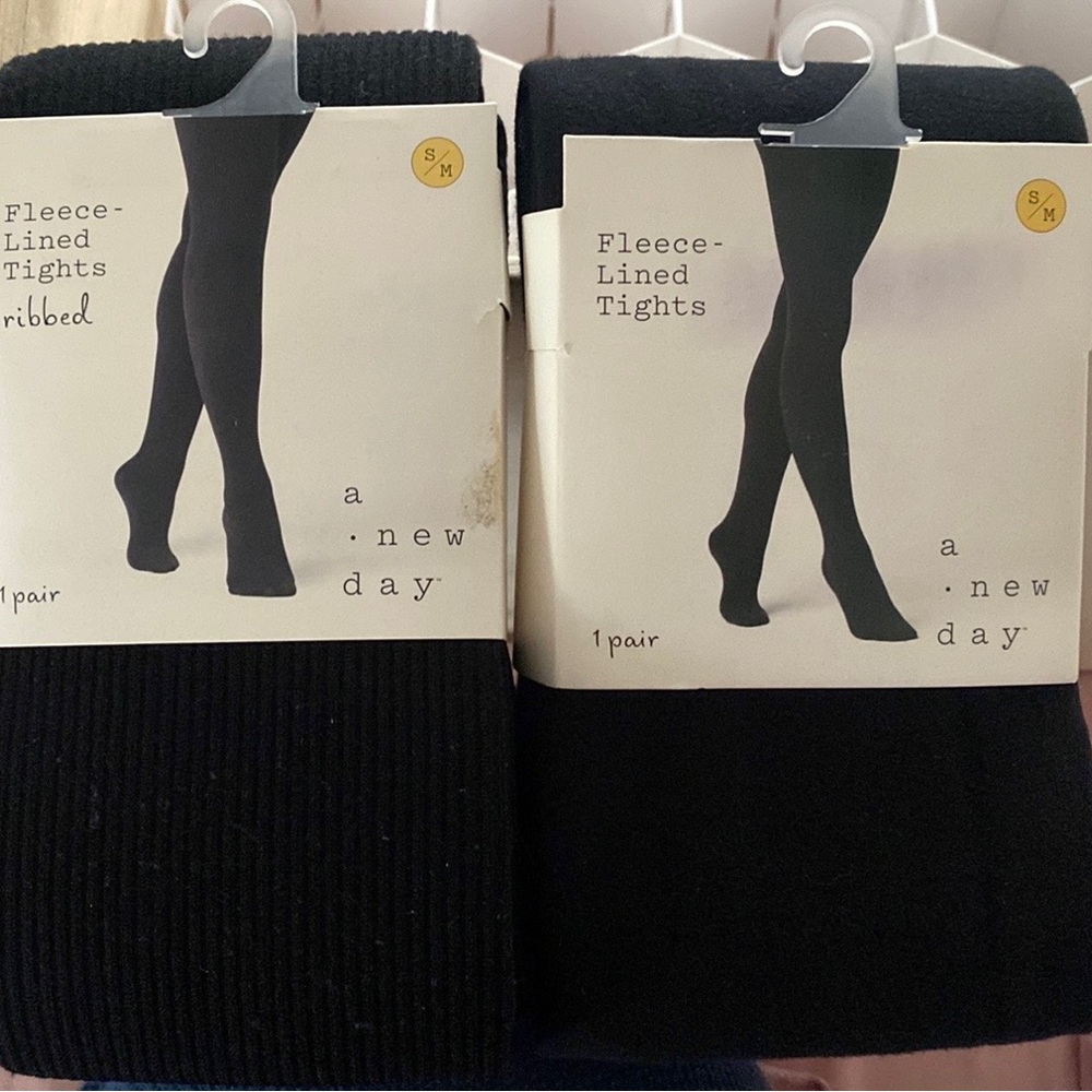 NWT still in package. One is ribbed, both are fleece lined. Selling both for $10